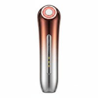 Microcurrent Facial Toning Device on white background